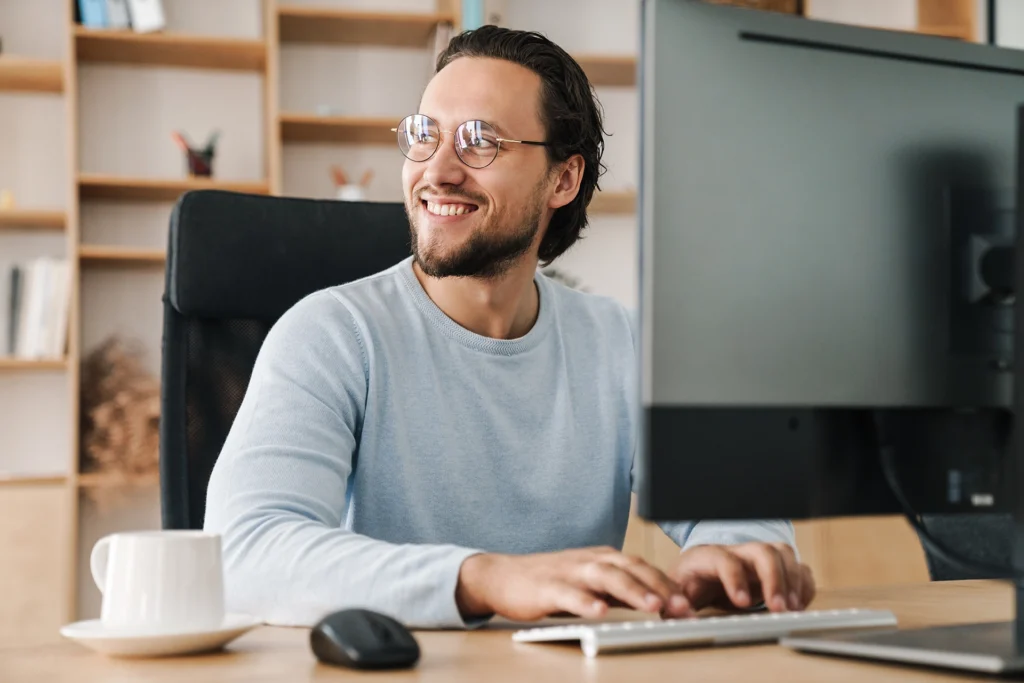 image of smiling unshaven programmer man working w 2023 11 27 05 25 02 utc