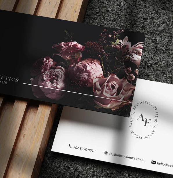 Aesthetics by Fleur black floral business cards and stationery flatlay