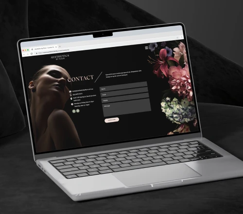 Laptop showing an aesthetics clinic website design
